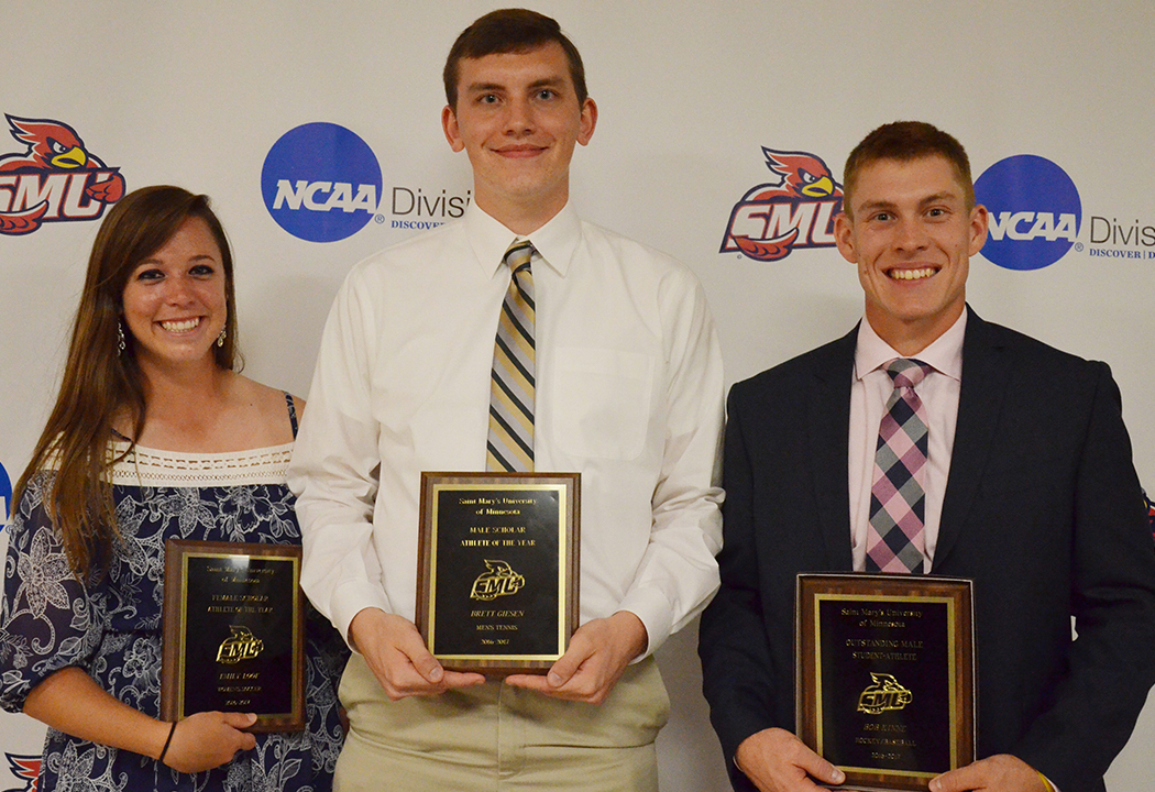 Student award winners: Emily Loof, Bob Kinne, and Brett Giesen. Not pictured is Brandi Blattner.