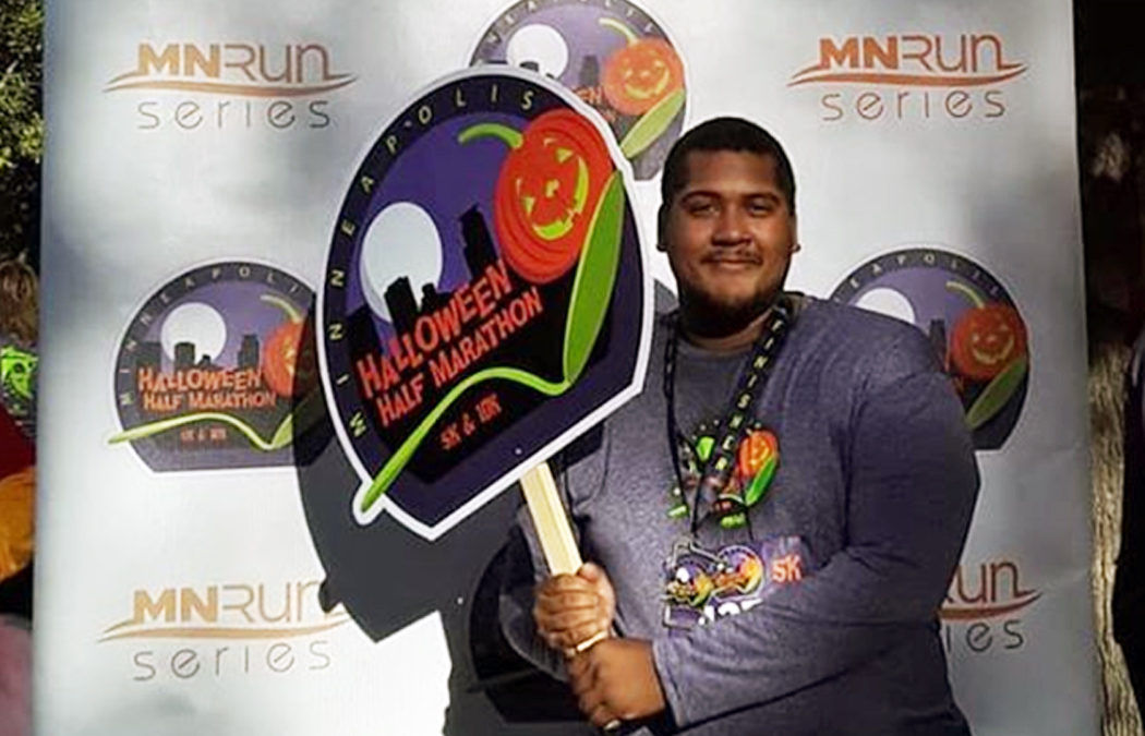 Aldontae Guess strikes a pose after finishing the 5K race at the Minneapolis Halloween Half Marathon in October.