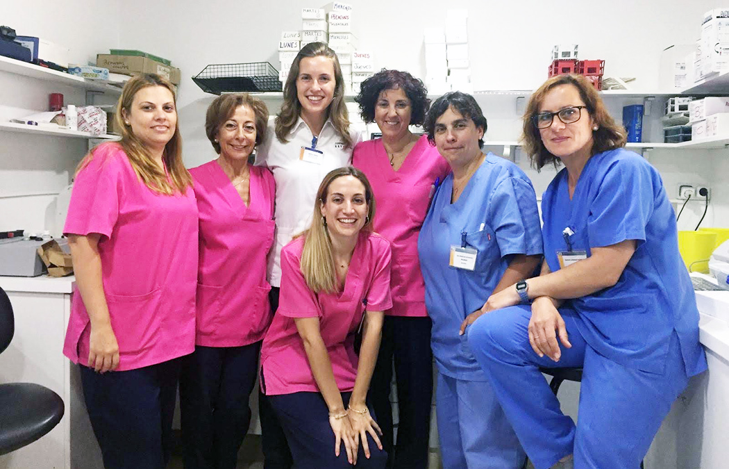 Senior Danielle Franke with co-workers in the laboratory at Centro Medico Estación in Alicante, Spain.