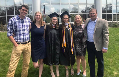 The Sunday family strikes a pose during the spring 2019 commencement.