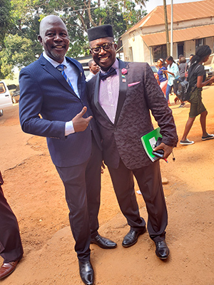 Sylvester Amara Lamin with Patrick Walker, head of the Department of Sociology and Social Work at Fourah Bay College, on the college campus in Freetown, Sierra Leone.