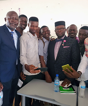 On the day of his lecture at Fourah Bay College, Sylvester Amara Lamin took time for photos with students from the college.