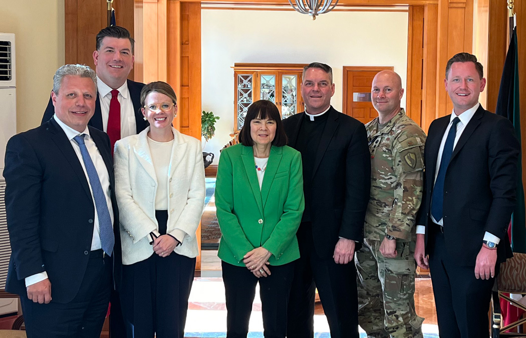 U.S. Ambassador Karen Hideko Sasahara receives Father Burns 