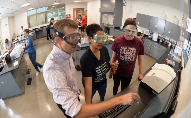 students working together in a lab setting.