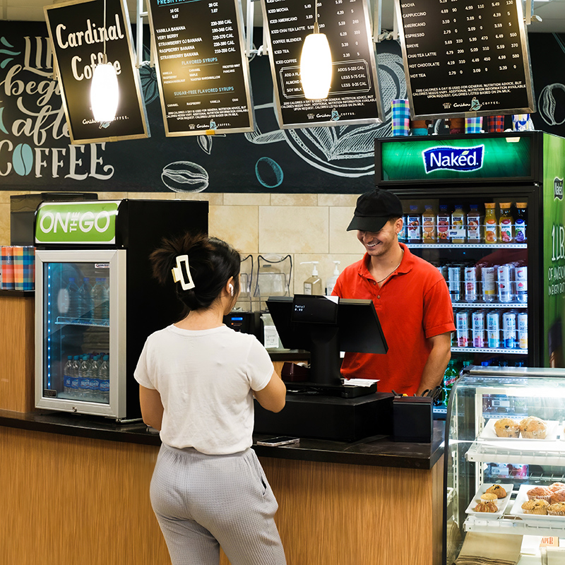 Student ordering from Cardinal Coffee